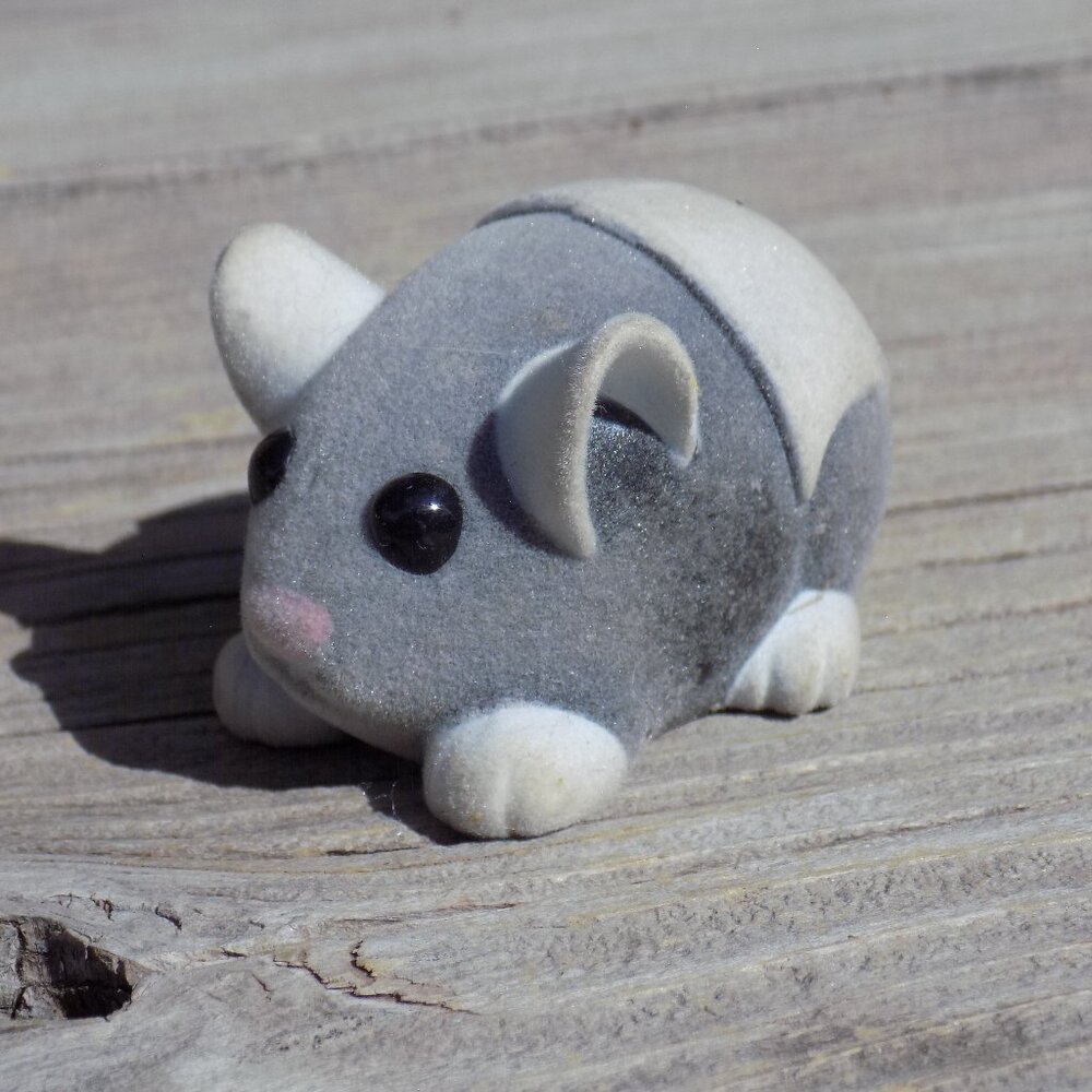Grey and white Small Mouse He Rolls *